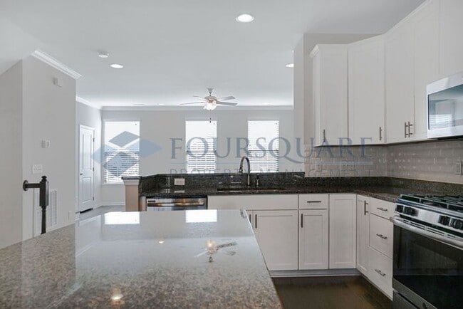 Building Photo - Spacious 3-Story Townhome with Bonus Suite & 2-Car Garage – In the Heart of RTP