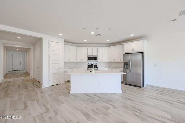 Building Photo - 7682 W Jackrabbit Ln