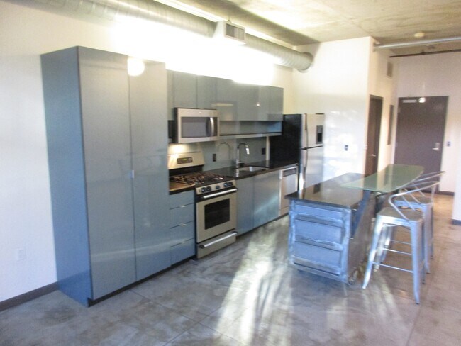 Building Photo - Streetcar Lofts - studio with 1 parking sp...