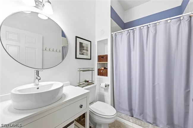 Building Photo - 25000 Tamiami Trl E