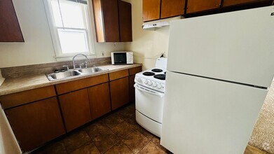 Building Photo - Key Investments-1305 N. State St.