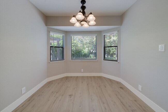 Building Photo - Bright and Stylish 4BD/2BA Home with 3 Car...