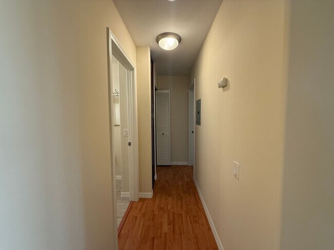 Building Photo - Upgraded Condo with Private Patio, AC, Pool, Gym, and Covered Parking in Gated Community