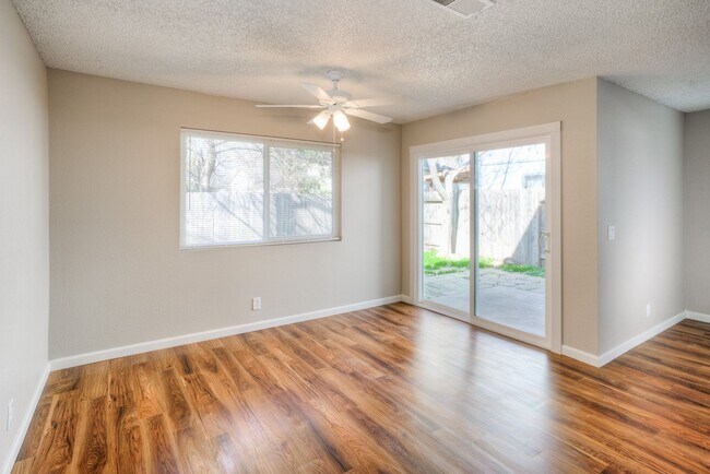 Building Photo - Greenwood Estates has an Excellent 2 Bedroom, 1.5 Bath Townhouse with a Backyard and Garage!