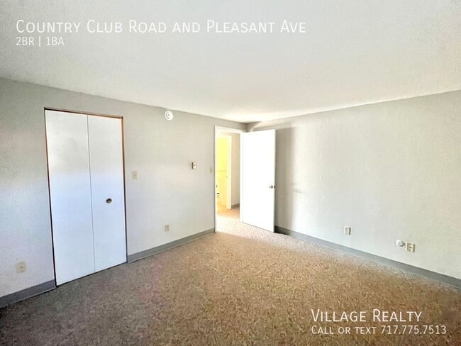 Building Photo - 605 Country Club Rd