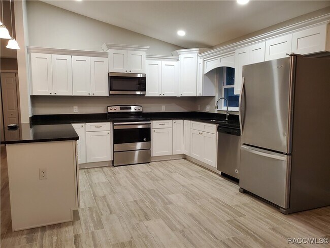 Building Photo - 8687 N Paradisea Dr