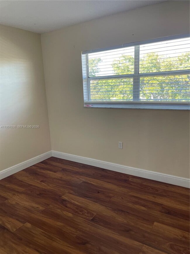 Building Photo - 8285 Sunrise Lakes Blvd