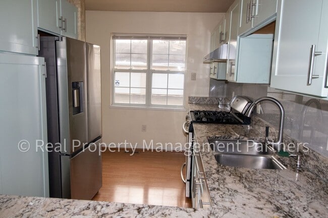Building Photo - Forest Hills 3 Bed Townhome with Garage, Pond View and Some Utilities Included