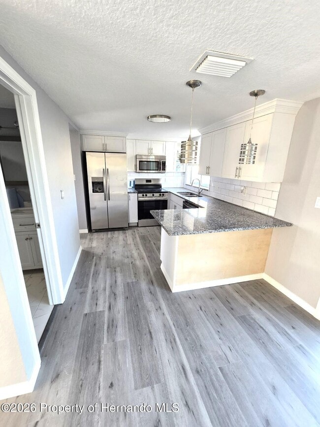 Building Photo - 13738 Coco Ave