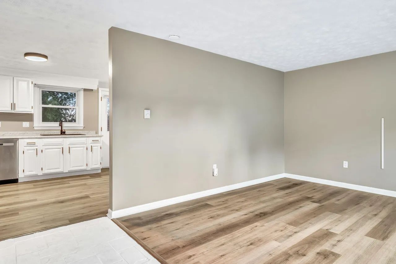 Living room leading to kitchen - 375 Bridgton Rd