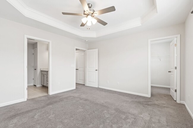 Building Photo - Stylish 4-Bedroom Townhome with Backyard O...