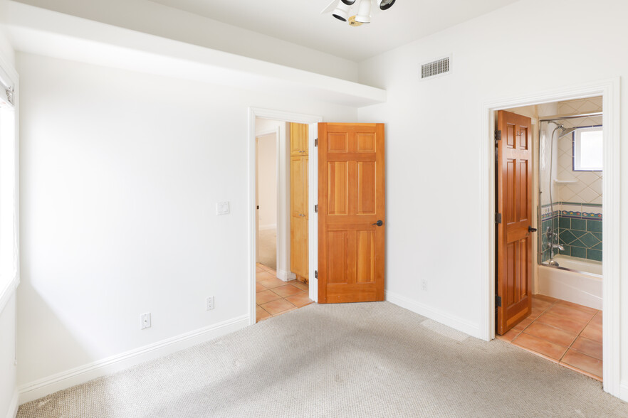 Primary Bedroom now has wood laminate floors - 308 19th Pl