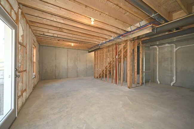 Building Photo - 3 bedroom, 2 1/2 bath duplex with a 2-Car ...