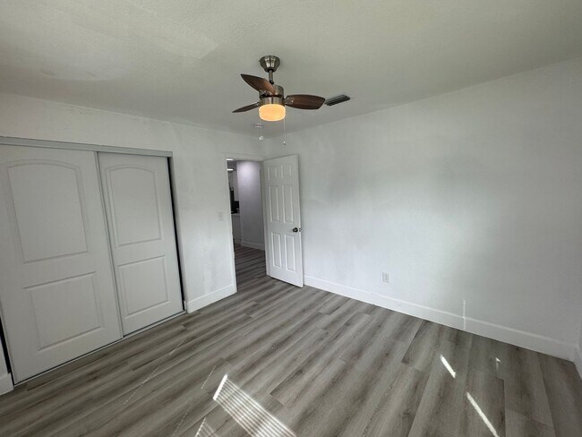 Building Photo - Recently Renovated 4/2 Home with Open Layout & Huge Backyard