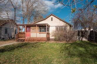 Building Photo - 4-bed, 2-bath home with large back yard