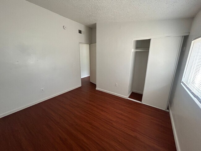 Building Photo - Single story home with large backyard and huge carport with plenty of storage.
