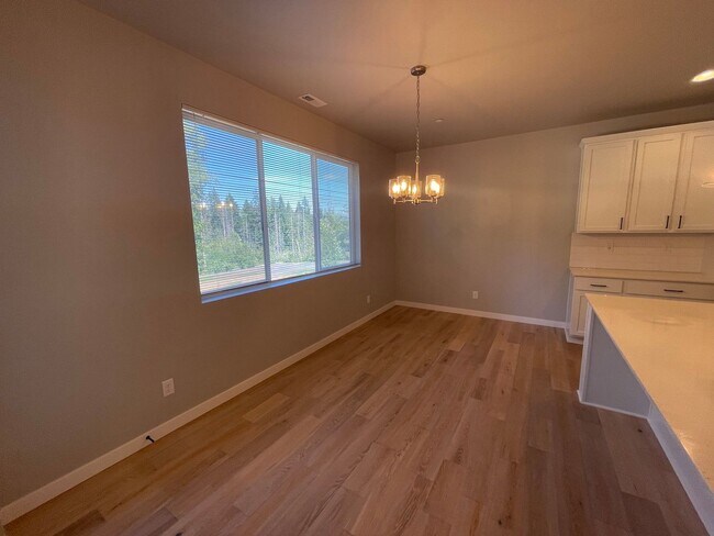 Building Photo - Like New 2022 Built 5 bedroom home