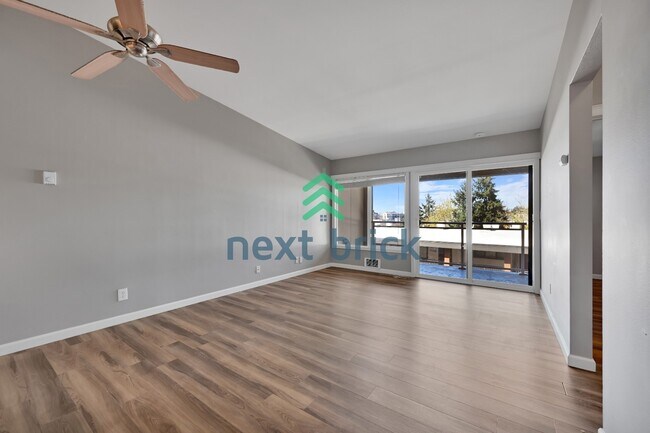 Building Photo - Downtown Bellevue Living | 2BR Condo with Storage & Balcony