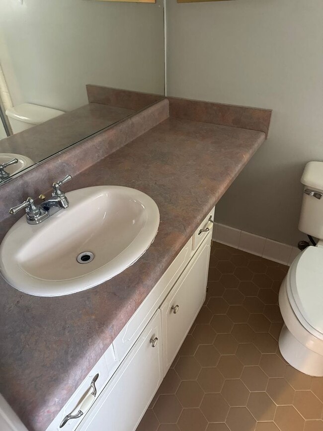 Building Photo - Spacious home with carport and garage!