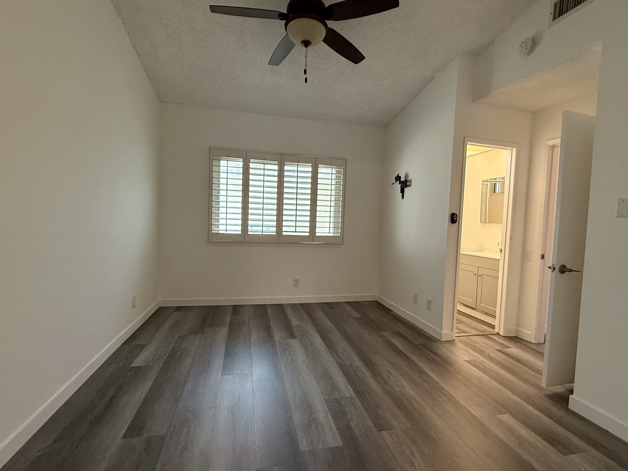Primary bedroom with private bathroom and walk in closet - 3500 W Manchester Blvd