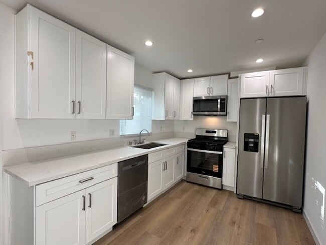 Building Photo - Completely remodeled and located on a quie...