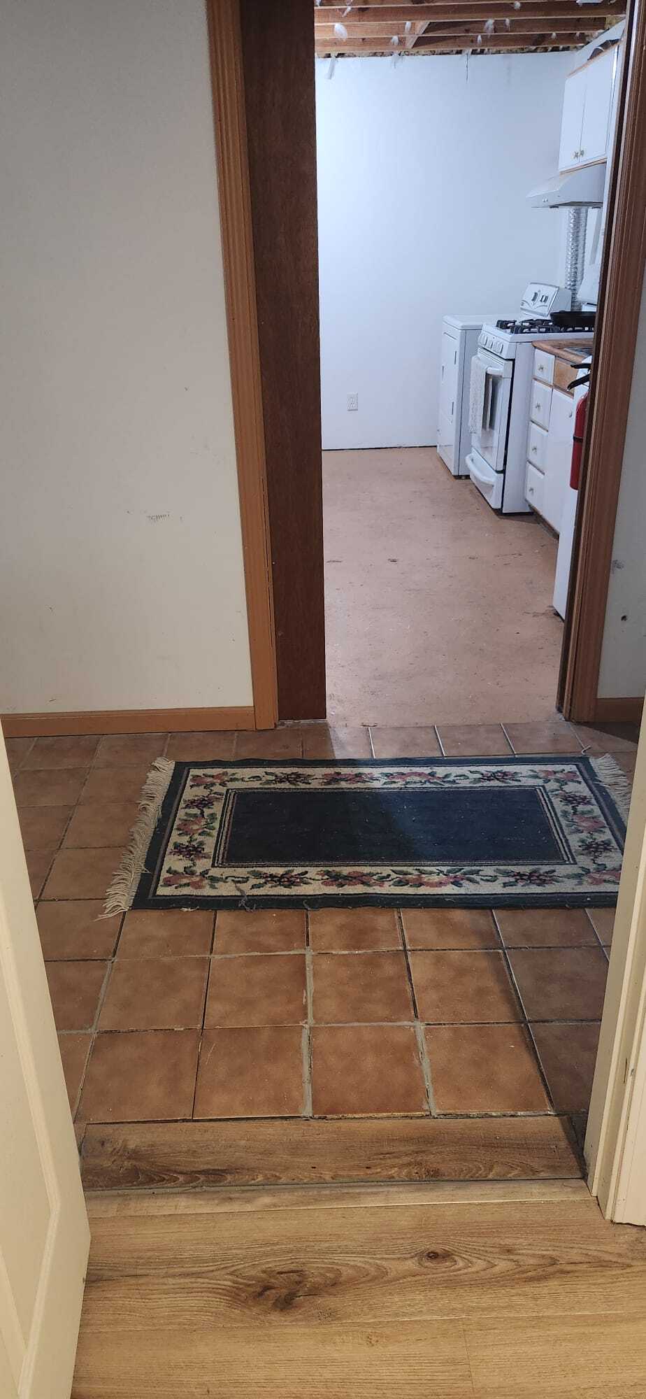 View of laundryroom/kitchen from bathroom door - 2116 Thaler Ave