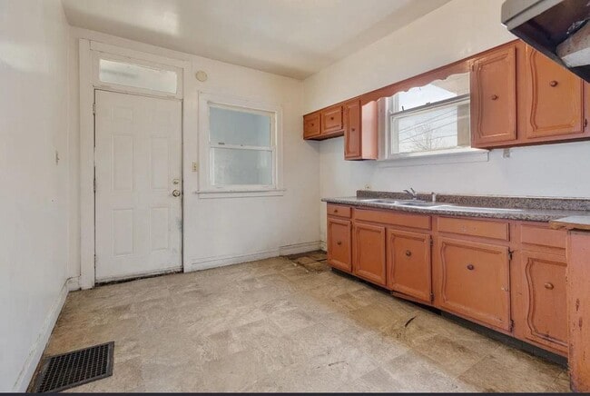 Building Photo - 1301 W 71st Pl