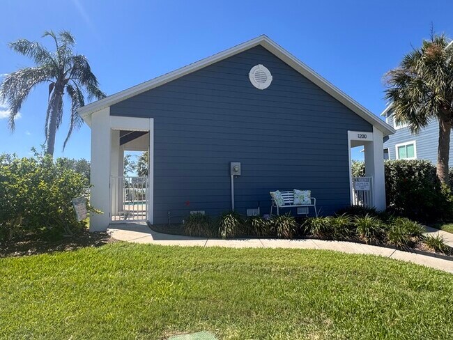 Building Photo - Coastal Luxury Awaits – 3-Story Townhome i...