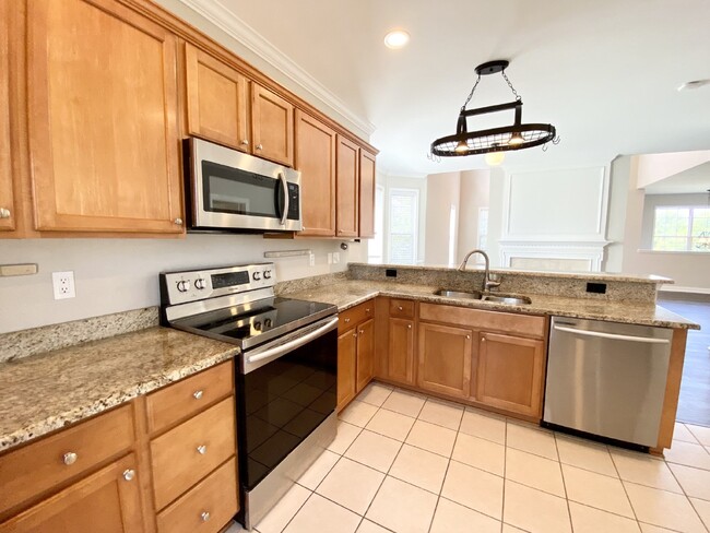 Building Photo - Spacious End Unit, Four Bedroom Townhouse in Cypress Ridge!