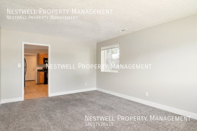 Building Photo - FREE 1ST MONTH'S RENT - Remodeled 2-bed Un...