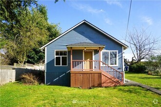 Building Photo - 2BDR House With HUGE Backyard ~ Centrally ...