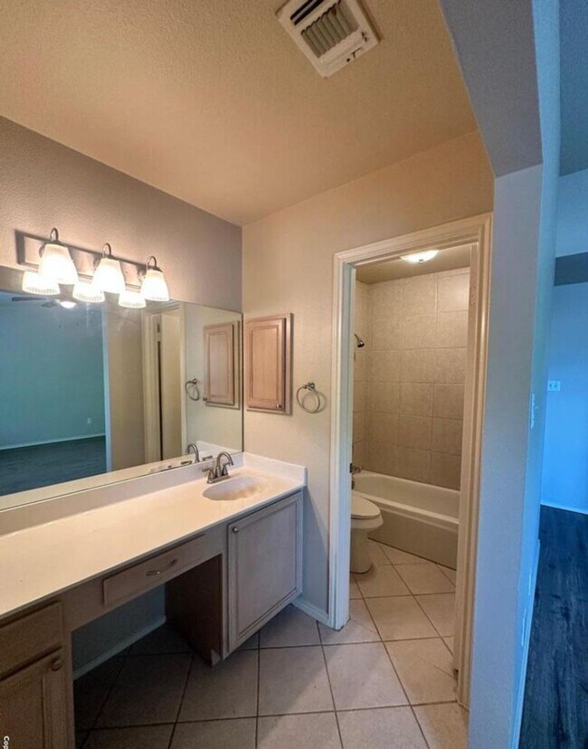 Building Photo - 3 BD/2.5 BA AVAILABLE IN GATED COMMUNITY I...