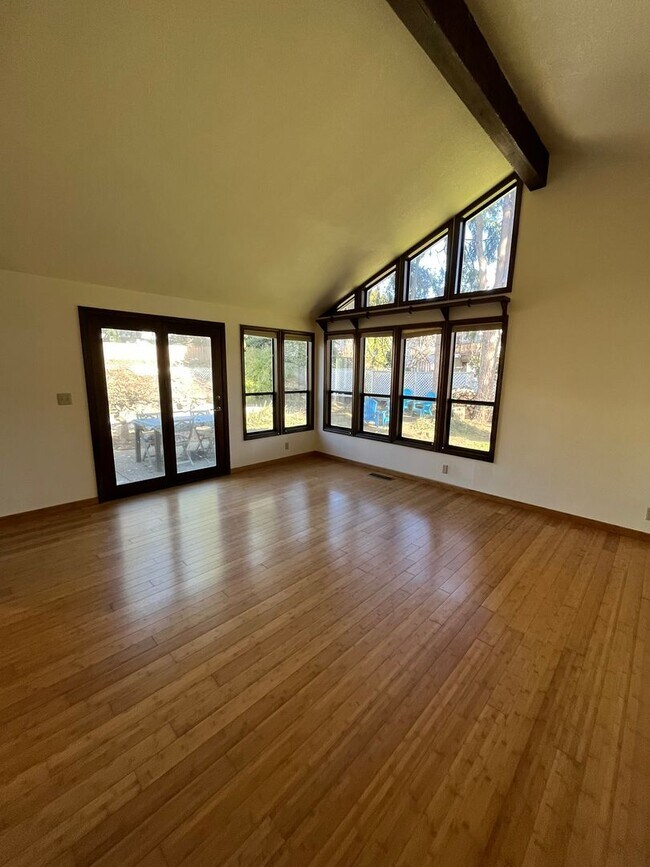 Building Photo - Beautiful One-Level Home with Sunroom, Vaulted Ceilings & Multiple Living Areas