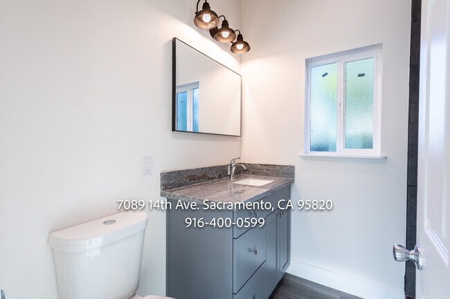 Building Photo - 7089 14th Ave
