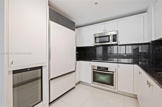 Building Photo - 6899 Collins Ave