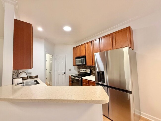 Building Photo - Modern 3BD, 2.5BA End Unit Raleigh Townhome with HOA Amenities Near I-540 & Triangle Town Center