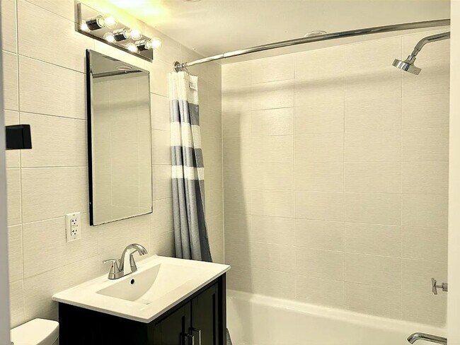Building Photo - Sleek One-Bedroom in Eastern Market - Parking Spot Included!
