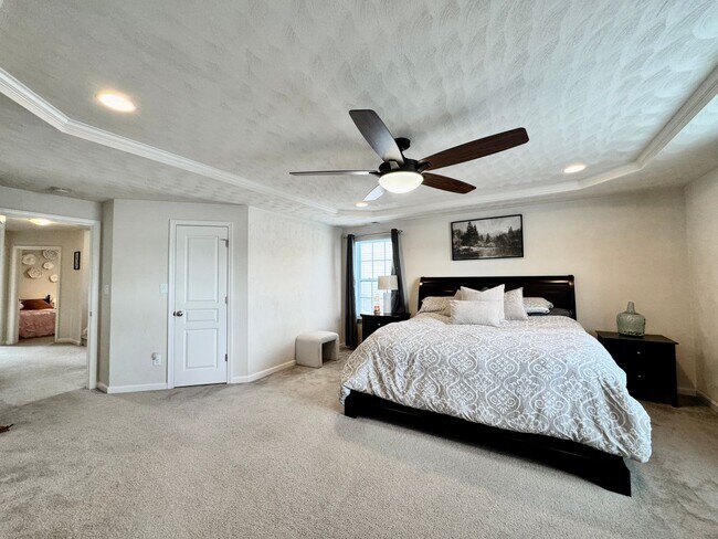 Building Photo - First-Time Rental, Available July 1st! Attached Garage - 2 Primary Suites - Pet-Friendly (Under 4...