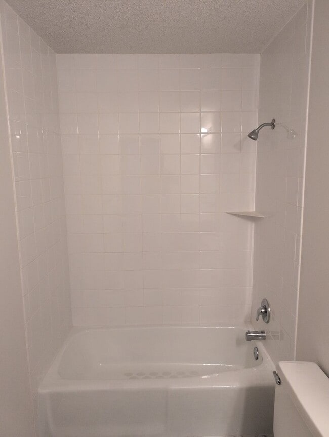 Building Photo - Fully Updated 3 Bedroom 3 Bath Townhouse with 2 Stall Attatched Garage