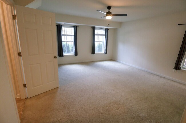 Building Photo - Spacious 4BR Home with Garage Steps from C...
