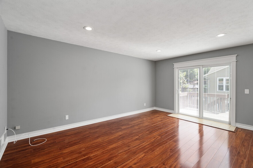 Living Room overlooking walkout private deck - 223 E Division St