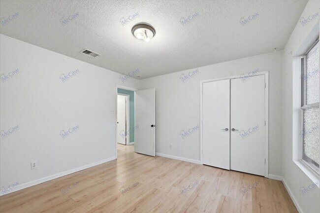 Building Photo - 8401 Swan Park Dr