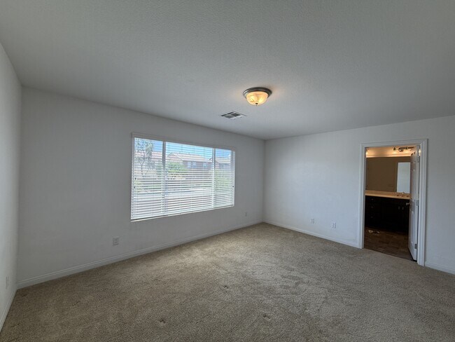 Building Photo - 7869 Tyrell Peaks St