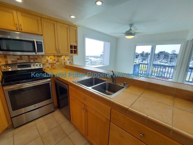 Building Photo - A Must See! Enchanting 2b/2ba with ocean v...