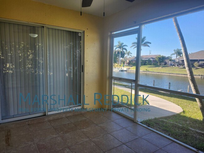 Building Photo - 3 BED 2 BATH SINGLE FAMILY HOME ON FRESH WATER CANAL WITH DOCK