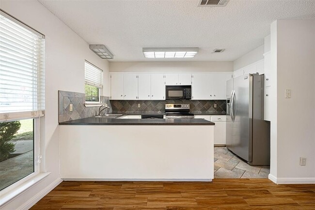 Building Photo - 8801 Camelia Ln