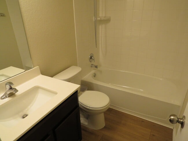 Building Photo - "Charming 3-Bedroom Home with Elegant Gran...