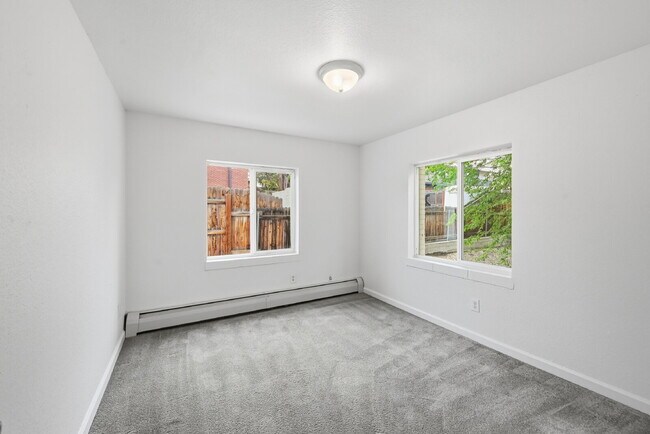 Building Photo - $1,340.95 with $300 Off the first month's rent,  2 Beds - 1 Bath, Condo in Denver with Granite Co...
