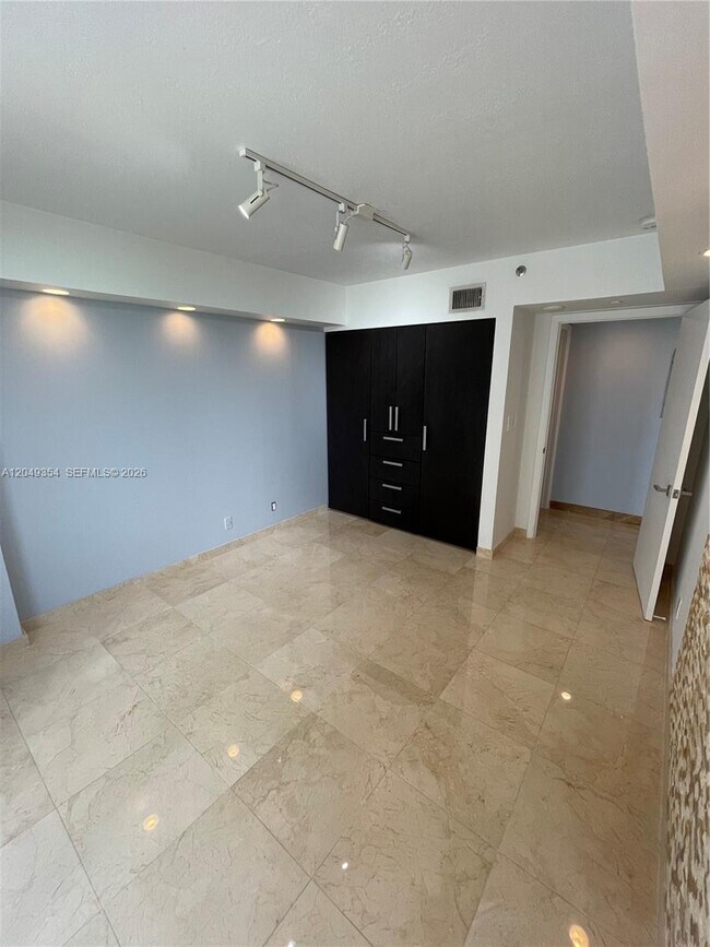 Building Photo - 8911 Collins Ave