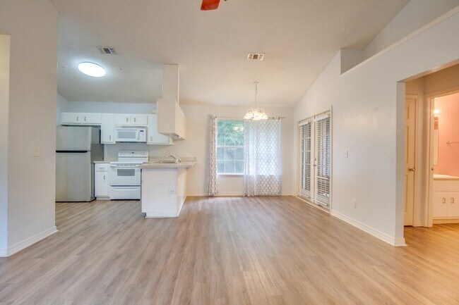 Building Photo - Northeast Pensacola 2 R, 2BA Home Near UWF with Wood-Look Flooring, Large Sunroom, Spacious Lot &...